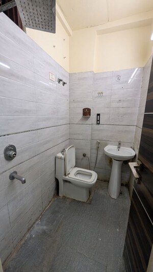 Bathroom in 2 BHK Builder Floor at Chahak Plaza, Shakti Khand – for Rent