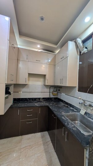 Kitchen in 2 BHK Builder Floor at Chahak Plaza, Shakti Khand – for Rent