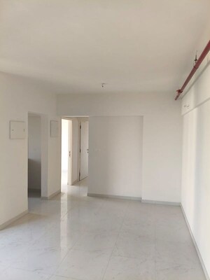 Building Lobby in 2 BHK Apartment at Runwal Gardens, Dombivli East – for Rent