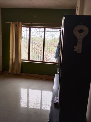 Bedroom in 2 BHK Apartment at Kandarpada – for Rent