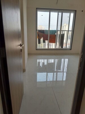 Building Lobby in 2 BHK Apartment at Samarpan Anuraj CHS, Borivali East – for Rent