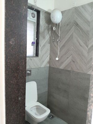 Bathroom in 2 BHK Apartment at Samarpan Anuraj CHS, Borivali East – for Rent