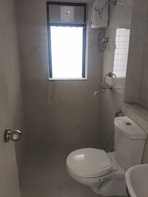 Bathroom in 1 BHK Apartment at Runwal Gardens, Dombivli East – for Rent