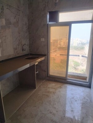 Kitchen in 2 BHK Apartment at Bhaveshwar Valencia, Ulwe – for Rent