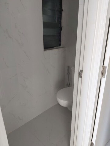 Bathroom in 1 BHK Apartment at Runwal Gardens Phase I, Dombivli East – for Rent