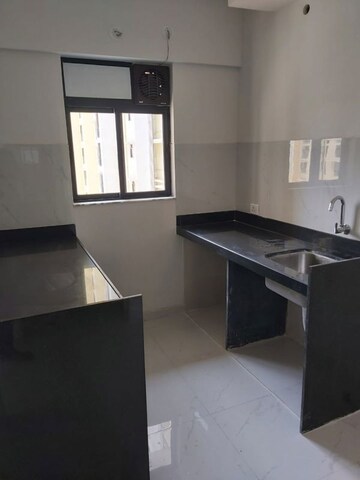 Kitchen in 1 BHK Apartment at Runwal Gardens Phase I, Dombivli East – for Rent