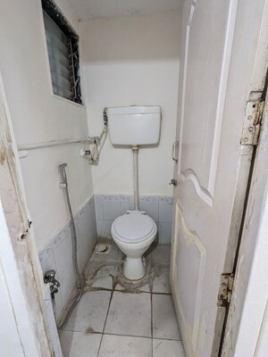 Bathroom in 1 BHK Apartment at New Mhada Tower, Malad West – for Rent