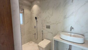 Bathroom in 4 BHK Apartment at Nathani Heights, Dalal Estate – for Rent