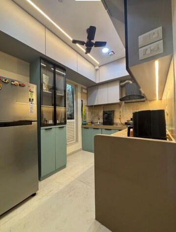 Kitchen in 2 BHK Apartment at Dosti West County, Balkum Pada – for Rent