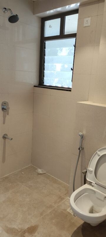 Bathroom in 2 BHK Apartment at Sethia Kalpavruksh Heights, Kandivali West – for Rent