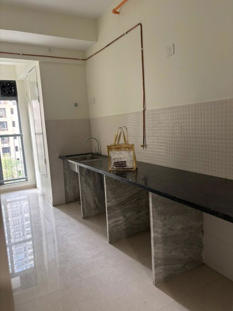 Kitchen, kalpataru-elitus 2 Bedroom 802 Sq.Ft. Apartment In Mulund West Mumbai 9903803