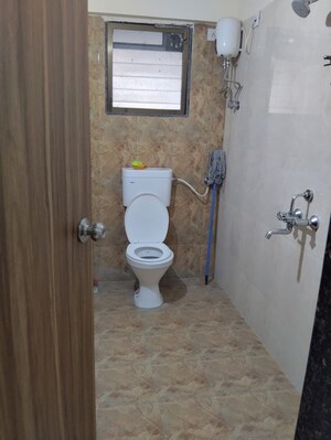 Bathroom in 2 BHK Apartment at Sunshine Tower, Mulund West – for Rent