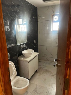 Bathroom in 3 BHK Builder Floor at Parklands, Sector 85 – for Rent