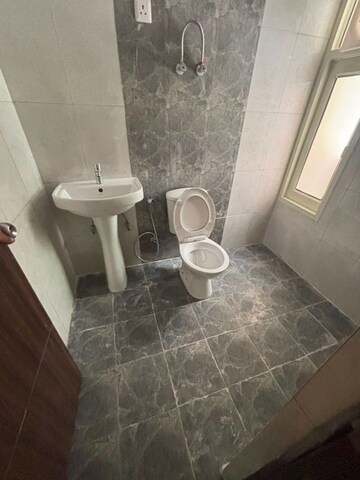 Bathroom in 2 BHK Apartment at JKG Palm Court, Sector 16c Greater Noida – for Rent