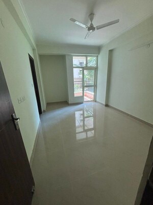 Room in 2 BHK Apartment at JKG Palm Court, Sector 16c Greater Noida – for Rent