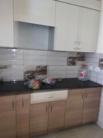 Kitchen in 2 BHK Apartment at Gaur City 2 - 14th Avenue, Sector 16c Greater Noida – for Rent