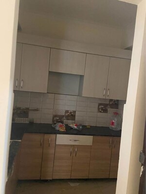 Kitchen in 2 BHK Apartment at Gaur City 2 - 14th Avenue, Sector 16c Greater Noida – for Rent
