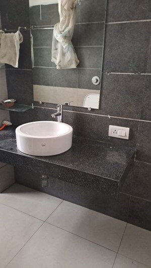 Bathroom in 4 BHK Apartment at Prahlad Nagar – for Rent