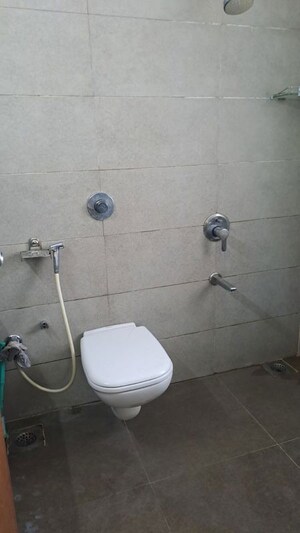 Bathroom in 4 BHK Apartment at Prahlad Nagar – for Rent