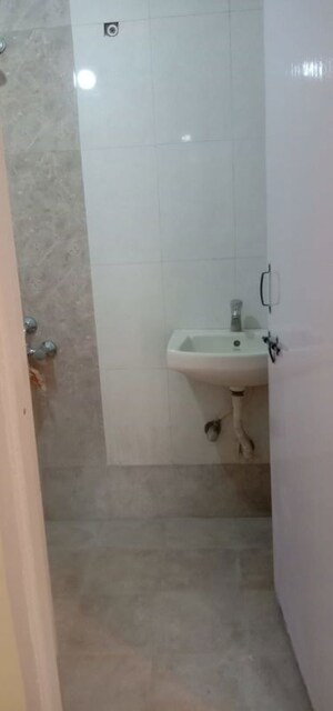 Bathroom in 1 RK Apartment at Orchid Complex Gundecha, Kandivali East – for Rent