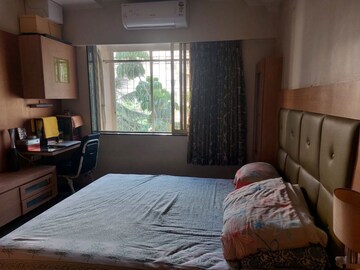 Bedroom in 1 BHK Apartment at Evershine Millennium Paradise, Kandivali East – for Rent