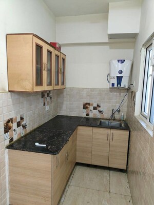 Kitchen in 1 BHK Apartment at Gaur City 2 - 14th Avenue, Sector 16c Greater Noida – for Rent
