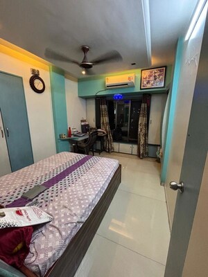 Bedroom in 1.5 BHK Apartment at Raunak Towers Naupada, Naupada – for Sale