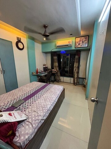 Bedroom in 1.5 BHK Apartment at Raunak Towers Naupada, Naupada – for Sale
