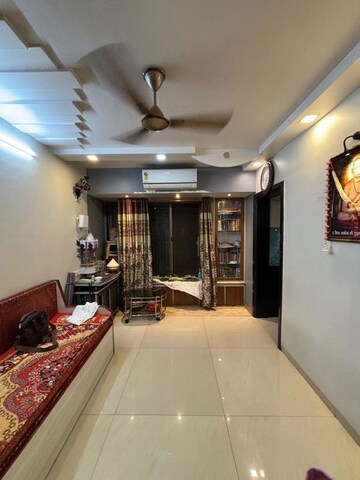 Living Room in 1.5 BHK Apartment at Raunak Towers Naupada, Naupada – for Sale