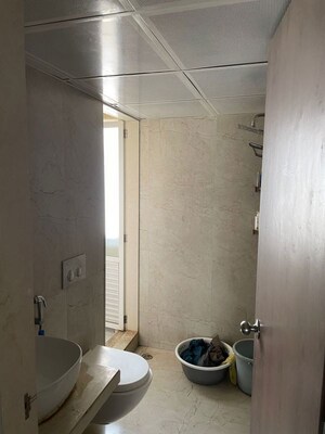 Bathroom in 1.5 BHK Apartment at Dosti West County, Balkum Pada – for Sale