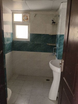 Bathroom in 2.5 BHK Apartment at VVIP Homes, Gaur City 2 – for Rent