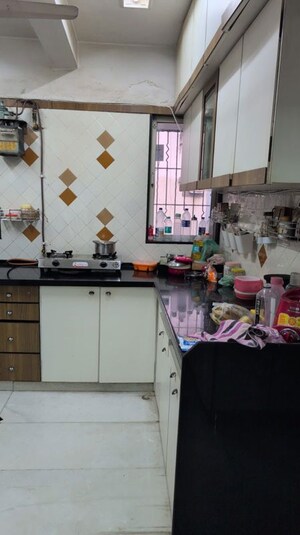 Kitchen in 1 BHK Apartment at New Gokul Heaven CHS, Kandivali East – for Sale
