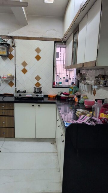 Kitchen in 1 BHK Apartment at New Gokul Heaven CHS, Kandivali East – for Sale