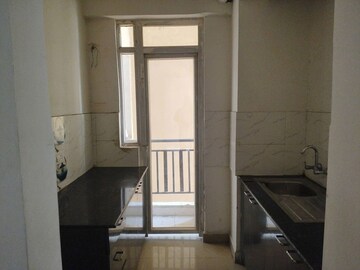 Kitchen in 2 BHK Apartment at Amrapali Golf Homes, Sector 4 Greater Noida – for Rent