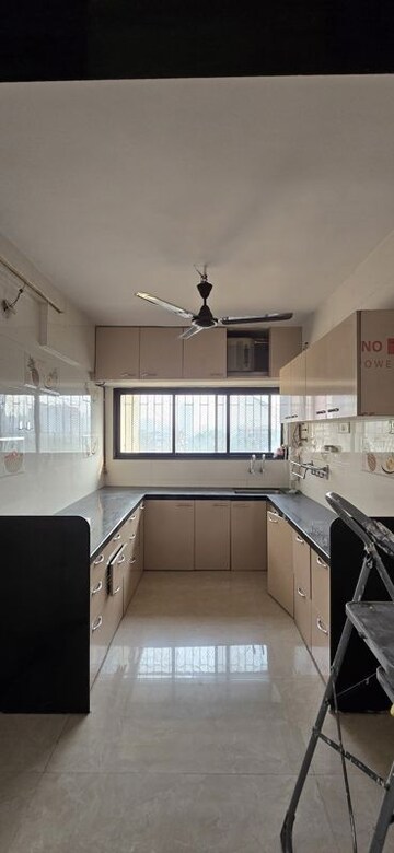 Kitchen in 3 BHK Apartment at Neha Society, Louis Wadi – for Sale