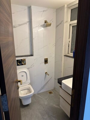 Bathroom in 3 BHK Apartment at Smart World Orchard, Sector 61 – for Rent