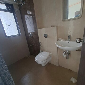 Bathroom in 2 BHK Apartment at Lotus Unity, Yari Road – for Rent