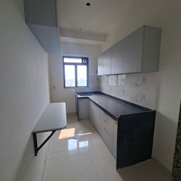 Kitchen in 2 BHK Apartment at Lotus Unity, Yari Road – for Rent