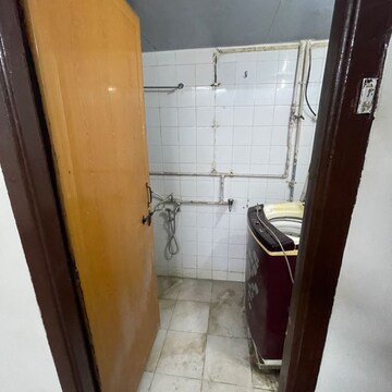 Bathroom in 3 BHK Apartment at Surmani Complex, Model Colony – for Rent
