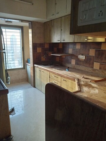 Kitchen in 2 BHK Apartment at Lakshachandi Heights, Goregaon East – for Sale