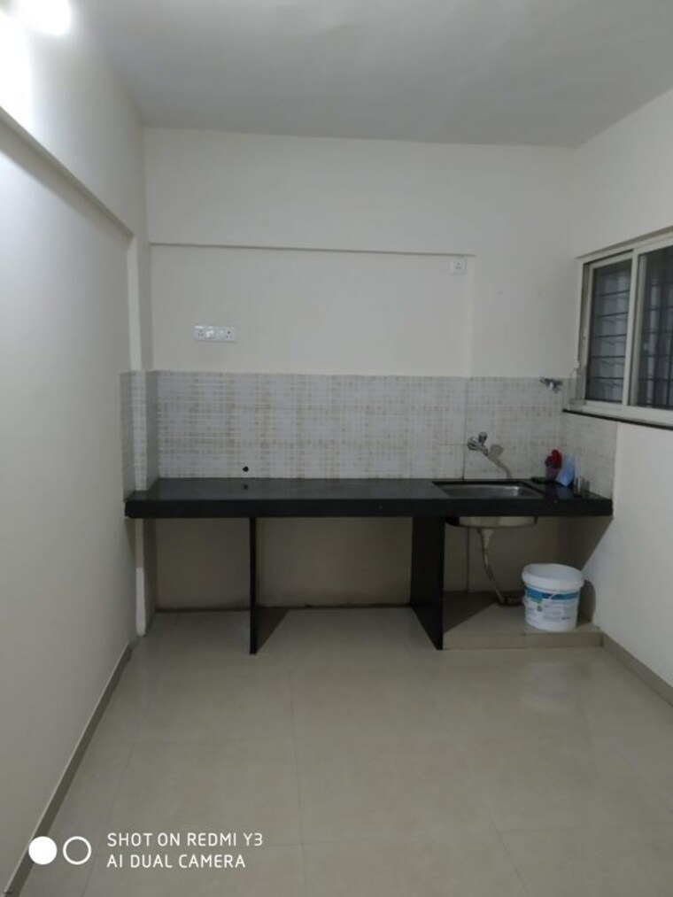 Kitchen, jalan-aura-county-pune 2 Bedroom 1078 Sq.Ft. Apartment In Wagholi Pune 9904401