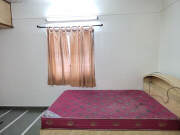 Master Bedroom in 2 BHK Apartment at Samruddhi Apartments, Camp – for Rent