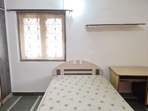 Bedroom in 2 BHK Apartment at Samruddhi Apartments, Camp – for Rent