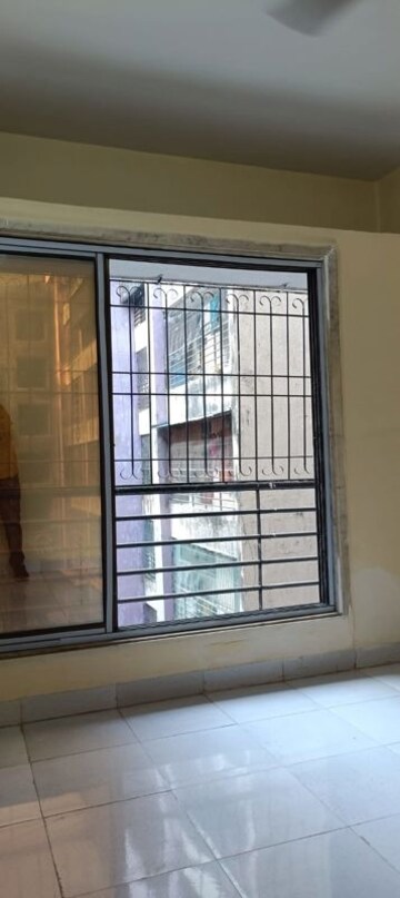 Room in 1 BHK Apartment at Rashmis Star City, Naigaon East – for Sale