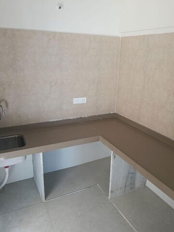 Kitchen in 2 BHK Apartment at Dosti West County, Balkum Pada – for Rent