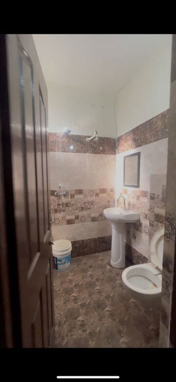 Bathroom in 3 BHK Builder Floor at Shri Devaji Residency, Dhakoli – for Rent