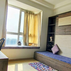 Living Room in 2 BHK Apartment at Bhartiya Nikoo Homes Phase 2, Kannur – for Rent