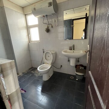 Bathroom in 2 BHK Apartment at Supertech The Romano, Sector 118 – for Rent