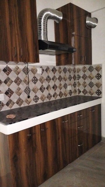 Kitchen in 4 BHK Apartment at Ideal Aquaview, Mahish Bathan – for Rent