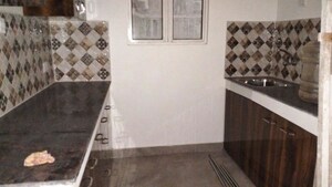 Kitchen in 4 BHK Apartment at Ideal Aquaview, Mahish Bathan – for Rent